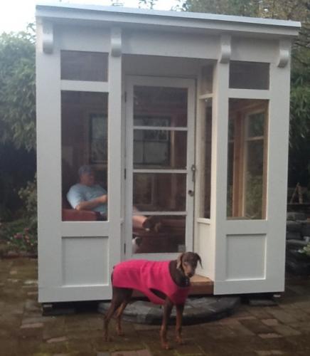 Shed from front, Ciara is wearing her pink sweater