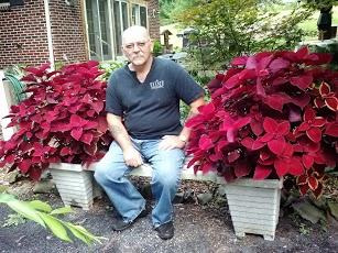 coleus in bench with hubby