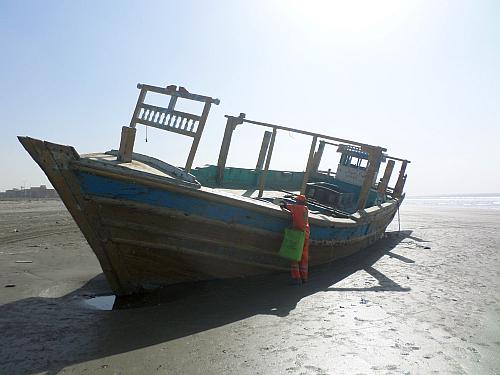 Beached fishing boat up close 2