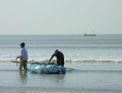 Fishermen at the beach 2