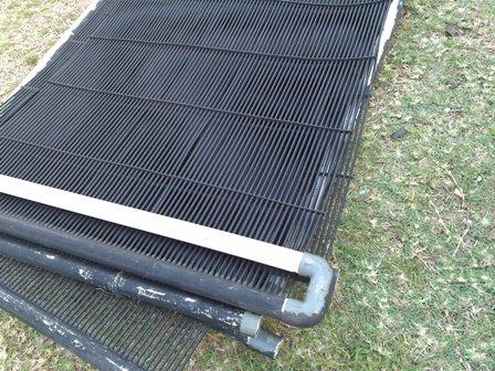 Two solar heating panels and six more to go.