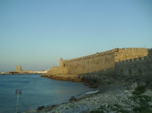 Rhodes - old town wall by the harbour