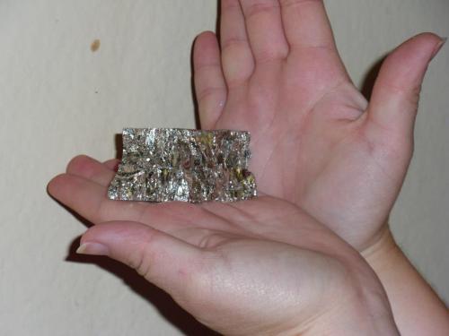 Holly modeling the bismuth chunk.