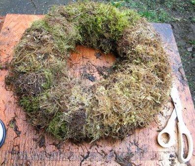 moss wreath ready and fishing line filaments trimmed