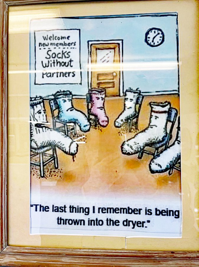 sox hanging on wall of laundromat.jpg